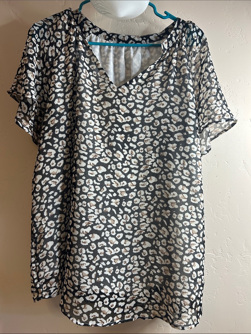 Women’s Black Animal Print V-Neck Blouse